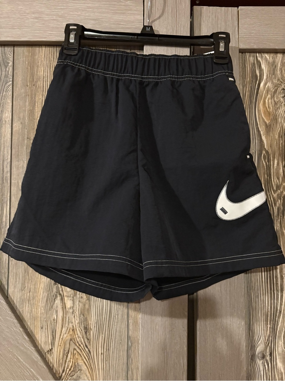 Nike Black Women's Athletic Shorts with White Swoosh Accent